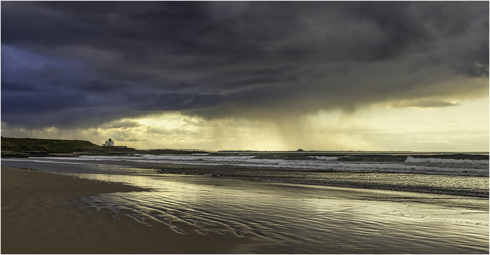 STORM OVER BANBURGH LIGHTHOUSE by Nigel Stewart